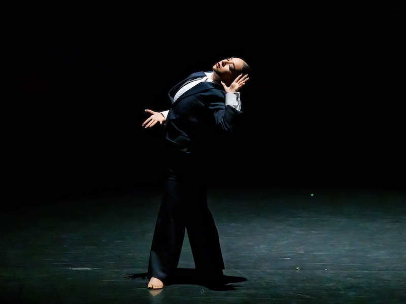 Dancer hand to ear