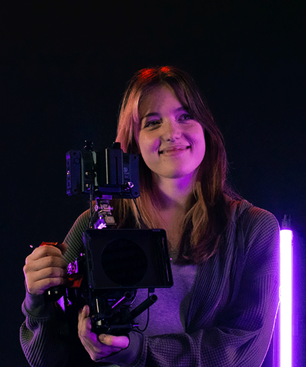 Jordan Devoy holding video camera
